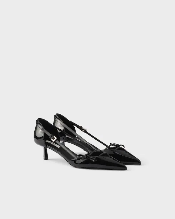Open side patent leather pumps