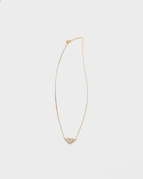 Eternal Gold micro triangle pendant necklace in yellow gold and diamonds