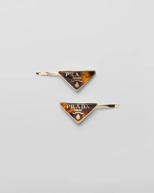 Plexiglas and metal barrette